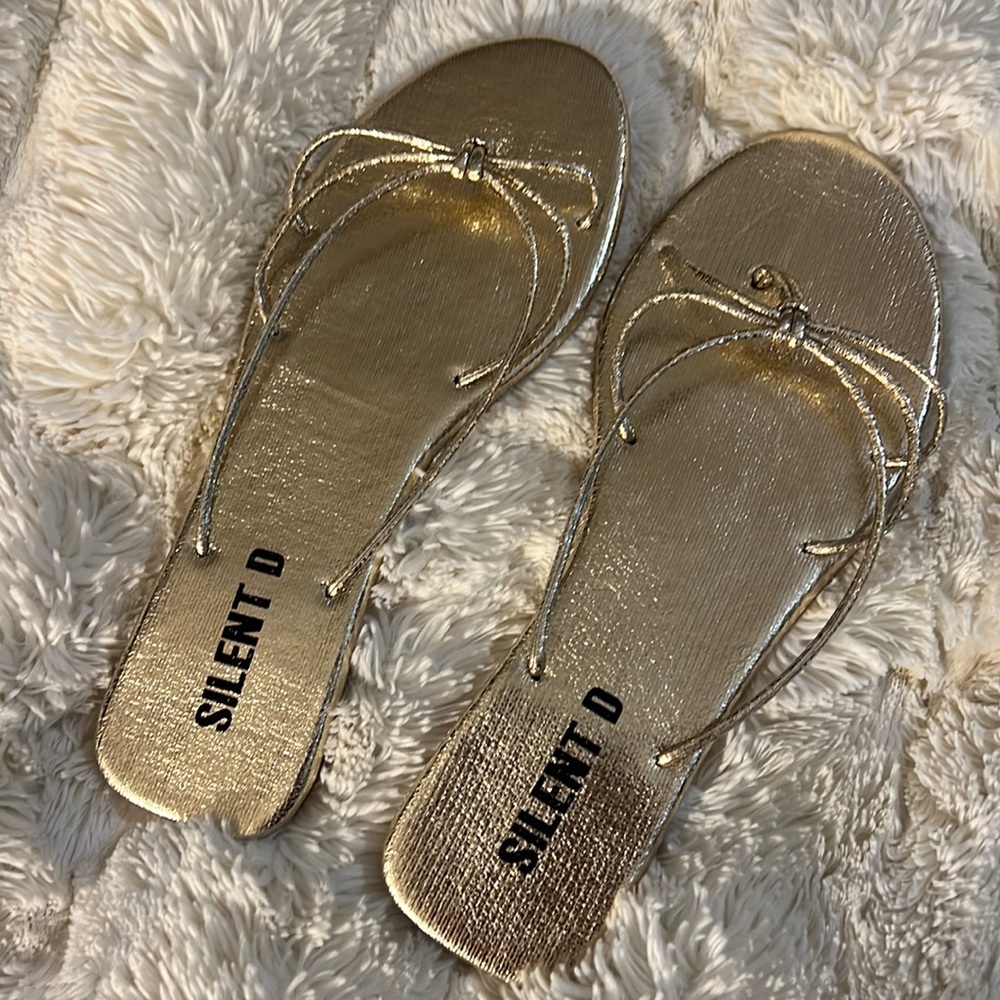 Size 38 Silent D sandals.